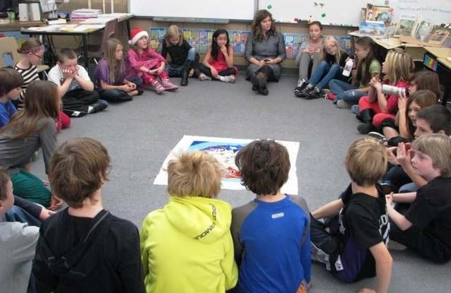 Students in a circle participating in an activity